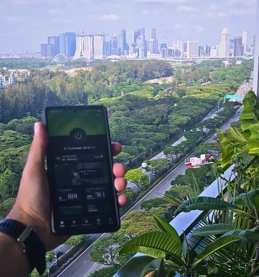 The ExpressVPN app with downtown Singapore's skyline in the background