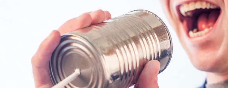 Speaking into a can telephone Speaking into a can telephone