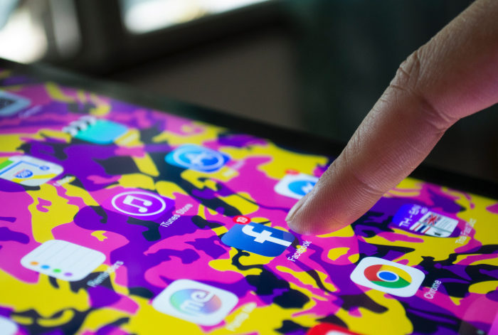 Facebook icon on a phone