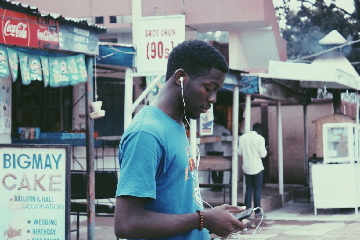 Guy with phone in Zaria, Nigeria