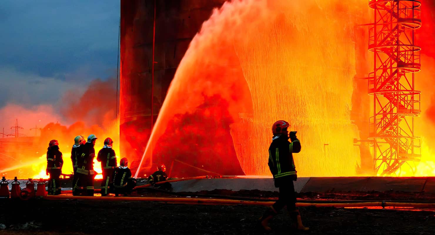 Cost of Internet Shutdowns 2022 report main image: photo of fire in Lviv, Ukraine after Russian bombing