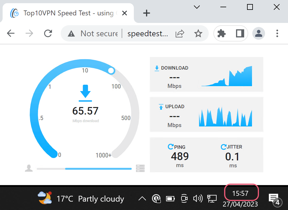Speed test running with the time of 15:57 clearly indicated.