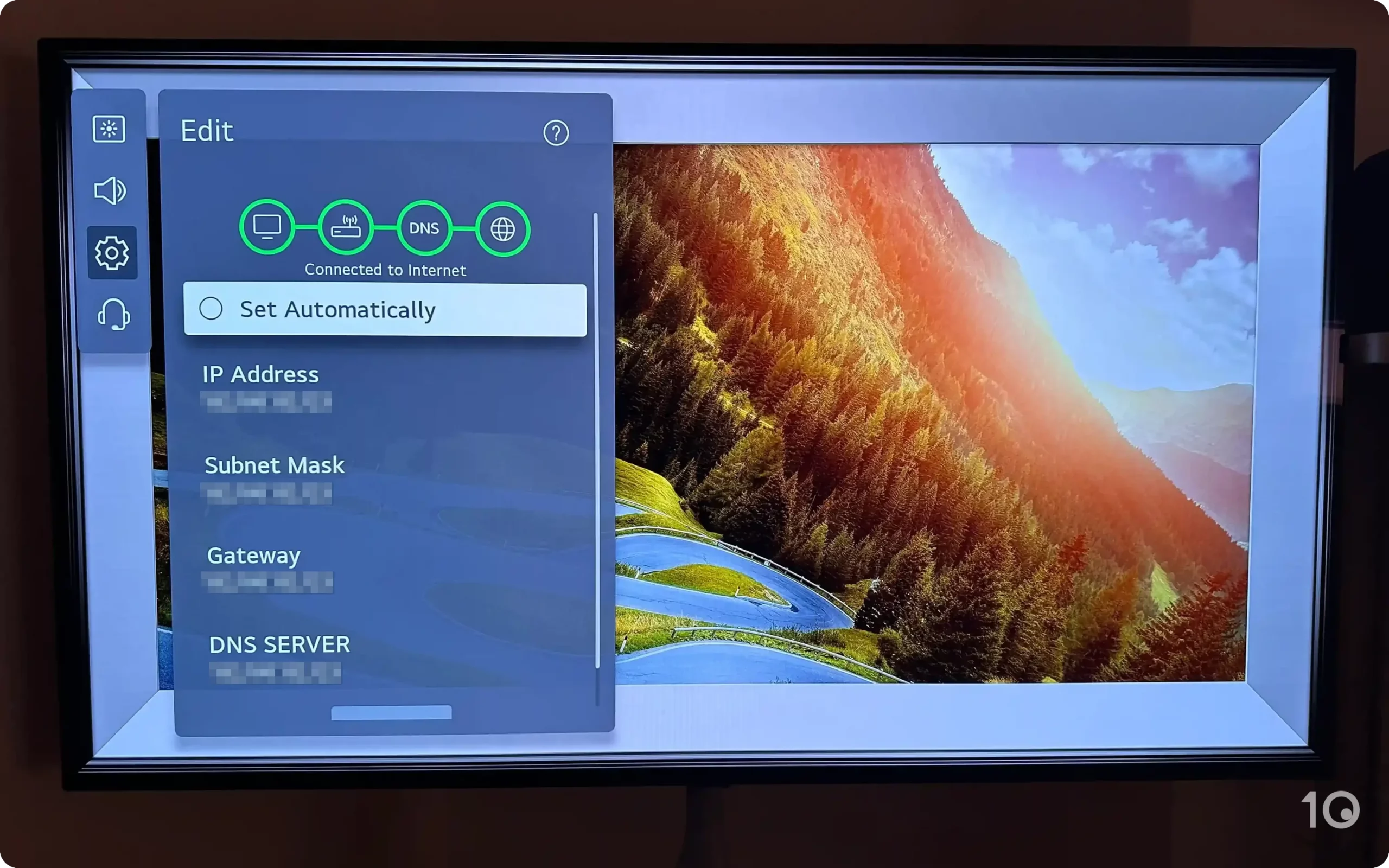 LG TV screen showing network settings. The 'Edit' menu is open, indicating a connection to the internet with options for 'Set Automatically', 'IP Address', 'Subnet Mask', 'Gateway', and 'DNS SERVER'.